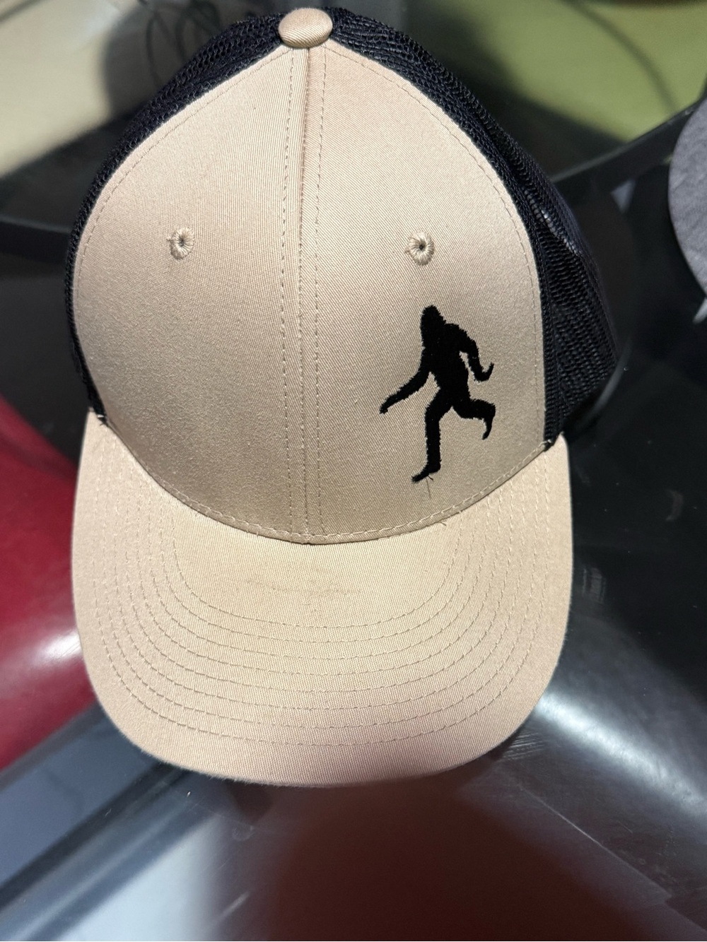 Sasquatch Logo Trucker Hat in Beige and Black